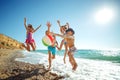 Cute kids having fun on the sandy beach in summer. Royalty Free Stock Photo