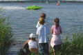 Cute kids at motorboat wm Royalty Free Stock Photo