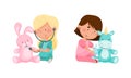 Cute kids playing doctors set. Girl curing their toys with medical tools cartoon vector illustration Royalty Free Stock Photo