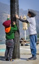 Cute kids wearing caps and having fun