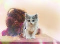 Cute kitten and ball of thread. Portrait of cute grey pretty kitten. Funny kitten and knitting in the interior. Empty place for