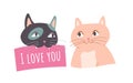 Cute kitty holding sign I love you in teeth, two cats for Valentines Day greeting card Royalty Free Stock Photo