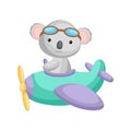 Cute koala pilot wearing aviator goggles flying an airplane. Graphic element for childrens book, album, scrapbook, postcard,