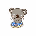 Cute koala weighed on the scales. Cute cartoon character