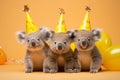 Cute koalas having fun at the party, yellow background
