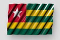 beautiful shiny flag of Togo with large folds lying flat isolated on grey - any occasion flag 3d illustration