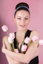 Cute lady with bouquet pink tulips Royalty Free Stock Photo