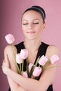 Cute lady with bouquet pink tulips Royalty Free Stock Photo