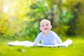 Cute laughing baby in the garden Royalty Free Stock Photo