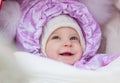 Cute laughing baby girl enjoying a stroller ride Royalty Free Stock Photo