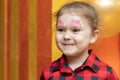 Cute laughing little girl with beautiful painted face Royalty Free Stock Photo