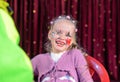 Cute laughing little girl in pantomime makeup Royalty Free Stock Photo