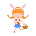 Cute laughing running girl with bunny ears holding basket with eggs.