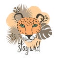 Cute leopard with tropical leaves. Stay wild lettering.