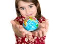 Cute lgirl holding little World Globe on her Hands Royalty Free Stock Photo