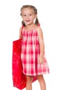 Smiling little girl with shopping bag Royalty Free Stock Photo