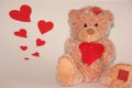 Cute littele bear with red heart.