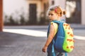 Cute little adorable toddler girl on her first day going to playschool. Healthy upset sad baby walking to nursery school Royalty Free Stock Photo