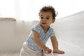 Cute little African American baby child play at home Royalty Free Stock Photo