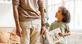 Cute little african american boy son holding hand drawing with happy family for dad on Fathers day Royalty Free Stock Photo