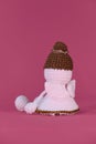 Cute little angel crocheted, handmade art. Rear view of the tiny wings. Amigurumi one white angel without face wears Royalty Free Stock Photo
