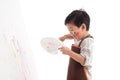 Cute little asian boy painting isolated Royalty Free Stock Photo