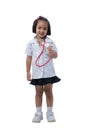 Cute Little asian girl doctor smiling and holding stethoscope while wearing Doctor`s uniform Royalty Free Stock Photo