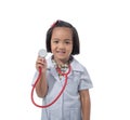 Cute Little asian girl doctor smiling and holding stethoscope while wearing Doctor`s uniform Royalty Free Stock Photo