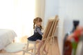 Cute little asian girl drawing on chalkboard in the white room at home, relax and summertime. Royalty Free Stock Photo