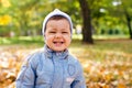 Cute little baby boy in autumn park Royalty Free Stock Photo