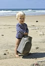 Cute little baby boy playing on the beach Royalty Free Stock Photo