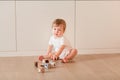 Cute little baby boy playing with blocks Royalty Free Stock Photo