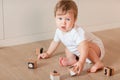 Cute little baby boy playing with blocks Royalty Free Stock Photo