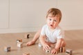 Cute little baby boy playing with blocks Royalty Free Stock Photo