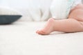 Cute little baby crawling on carpet indoors, closeup Royalty Free Stock Photo