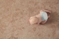 Cute little baby crawling on carpet indoors, with space for text Royalty Free Stock Photo