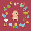 Cute little baby in diaper with newborn essentials