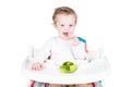 Cute little baby eating broccoli Royalty Free Stock Photo