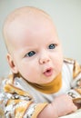 Cute little baby girl with amazement on her face Royalty Free Stock Photo