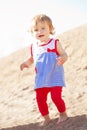 Cute little baby girl on the beach Royalty Free Stock Photo