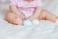 Cute little baby girl, playing with colorful easter eggs Royalty Free Stock Photo