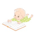 Cute little baby lay on tummy, reading book Royalty Free Stock Photo