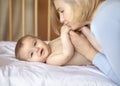 Cute little baby and loving mother, closeup Royalty Free Stock Photo