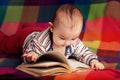 Cute little baby reading book Royalty Free Stock Photo