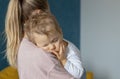 Cute little baby sleeps sweetly on mom's shoulder Royalty Free Stock Photo