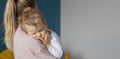 Cute little baby sleeps sweetly on mom's shoulder Royalty Free Stock Photo