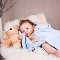 Cute little baby todler infant lying on blanket