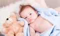 Cute little baby todler infant lying on blanket