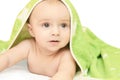 Cute little baby. Under bath towel. Happy kid portrait. White background Royalty Free Stock Photo