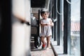 cute little baby walking in one shoe Royalty Free Stock Photo